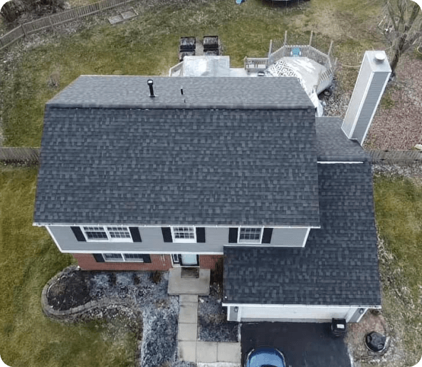 aerial view of a home by a drone roof inspection