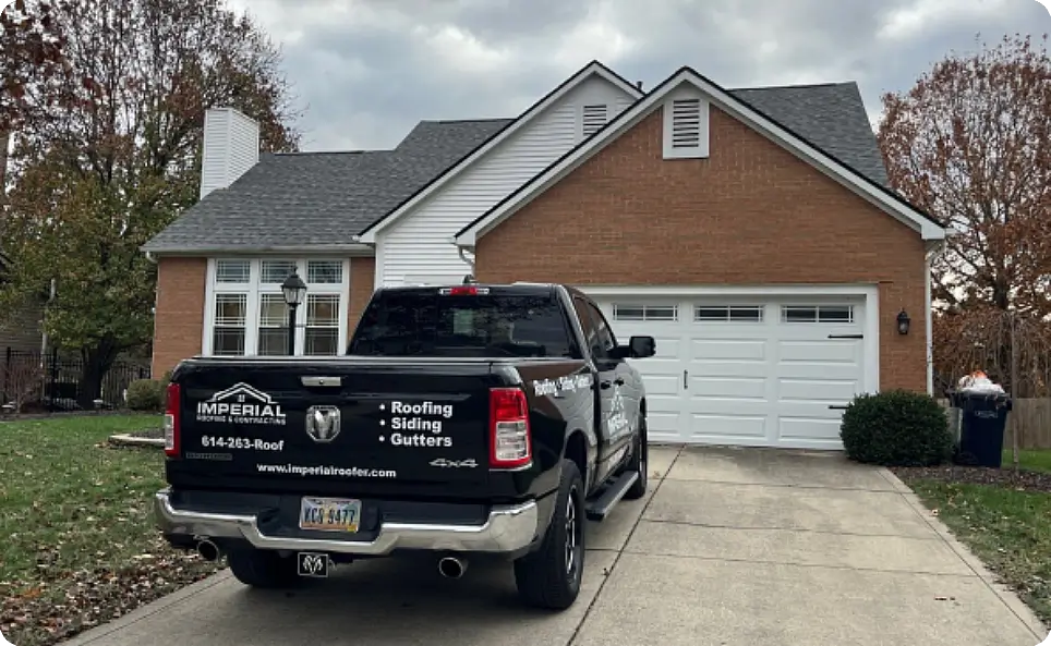 Imperial Roofing Company professional services with truck