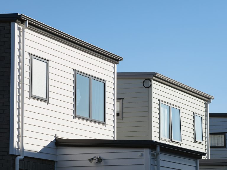 a home displaying a single hung window to answer the question "What is a single hung window?"