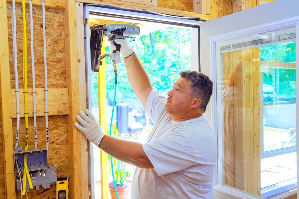 A storm door installation in process