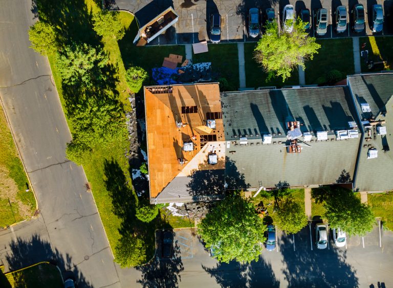 A roof replacement in progress in response to the question "How often does a roof need to be replaced?"